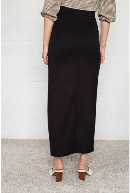 Black maxi skirt with front slit in a thick and forgiving fabrication